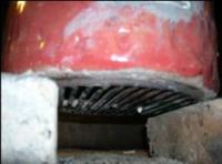 Grate Under chimney to Hold Charcoal
