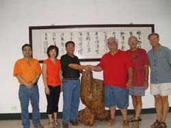 Officials from Shengzhou Stove and Aprovecho Seal the Deal