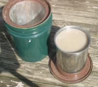 7.5 liters of boiling pinto beans sits on the insulated lid.