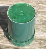 On goes the Green Pail